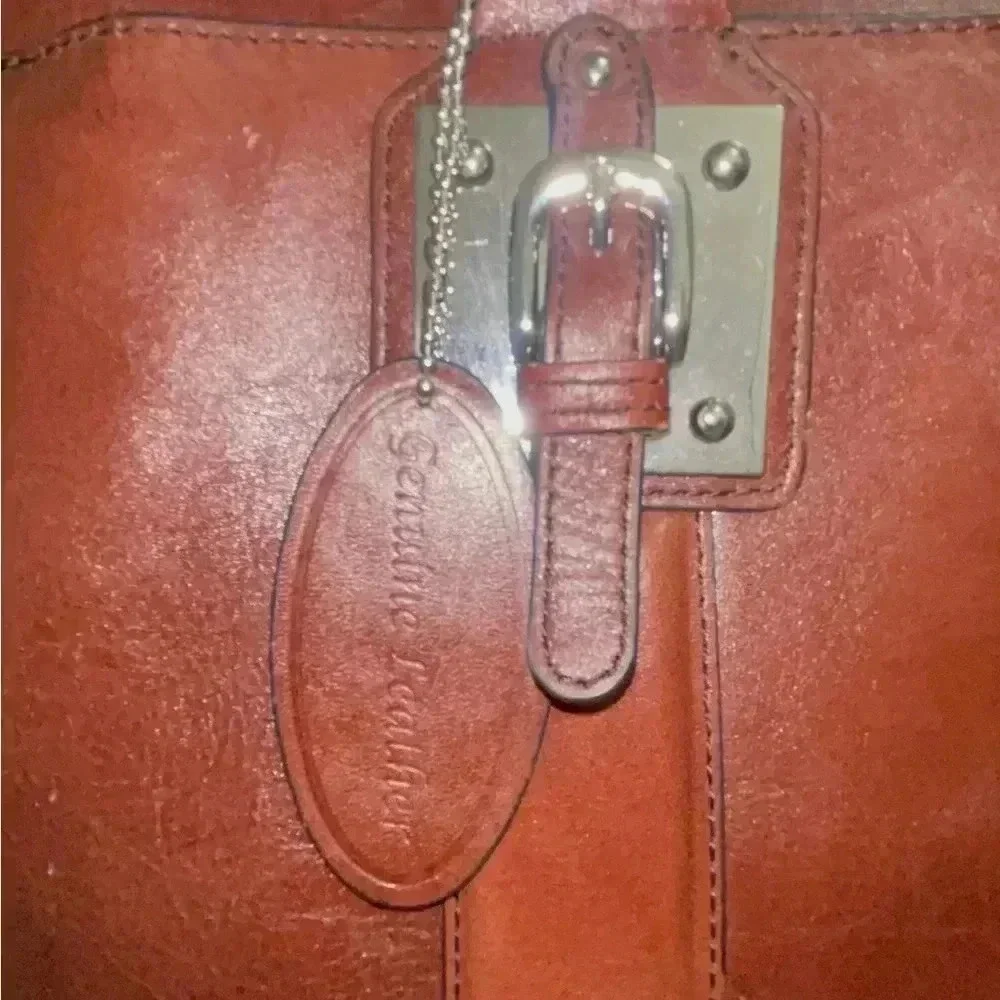 Wilson leather original back, rown color great conditions with adjstbel strap
